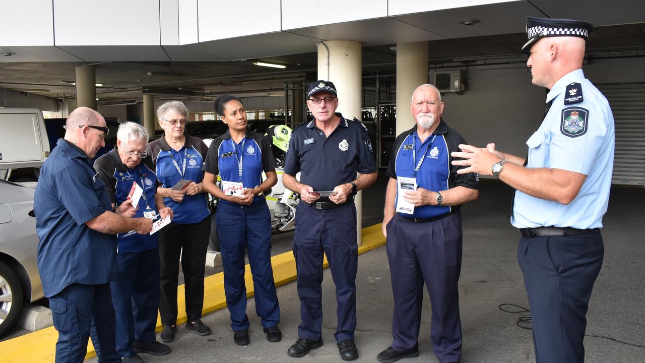 Acting Superintendent Mark Burgess and Senior Sergeant Ashley Hull speaking to the Volunteers in Policing for Operation Cathedral. Ray Whiting is on the far right.