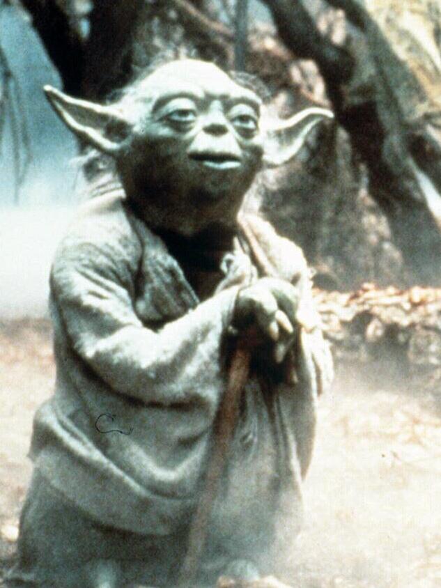 Yoda who was played by Frank Oz.