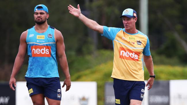 Justin Holbrook directs traffic at training as David Fifita looks on. Picture: Jason O’Brien