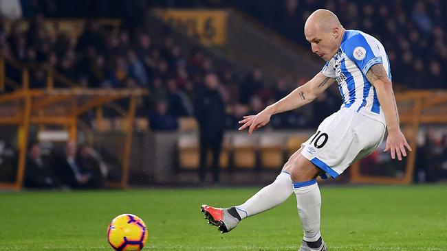 Australia’s Aaron Mooy injured his knee playing for Huddersfield