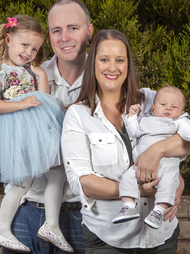 Asher with his parents Simon Duke and Sarah White and sister, 3. Picture: Emma Brasier