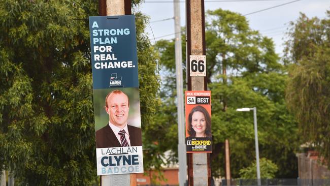 Examples of corflute election signs during the 2018 State Election. Picture: AAP/Keryn Stevens