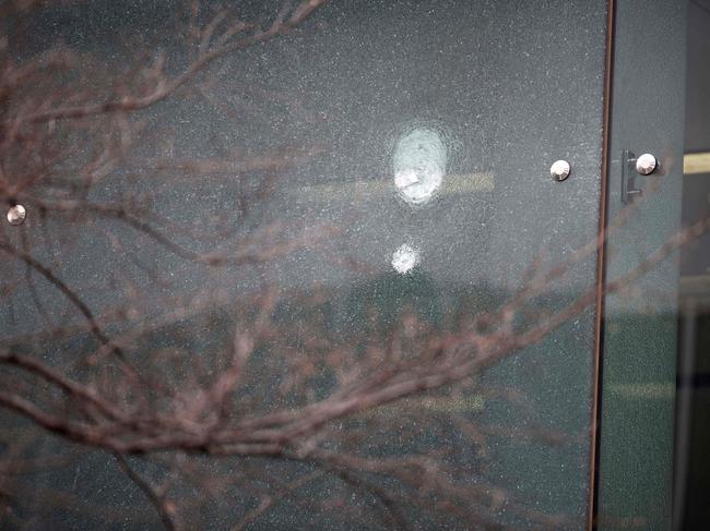 At least three bullets are believed to have hit the windows near the Qantas check in counters. Picture: NCA NewsWire / Gary Ramage