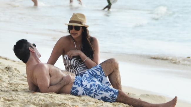 With girlfriend Lauren Silverman on holiday in Barbados. Picture: Splash News