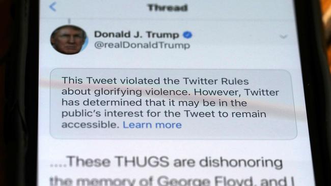 Twitter shields a Donald Trump tweet it said violated its policies. Picture: AFP