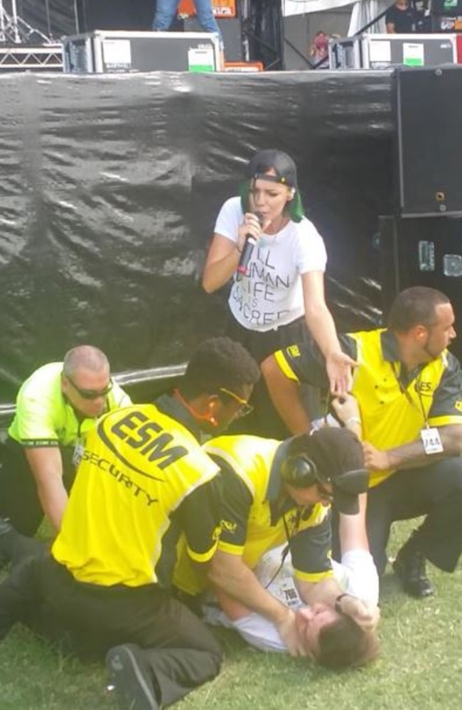 Incident ... Tonight Alive lead singer Jenner McDougall turns on security at the Soundwave music festival. Picture: Twitter