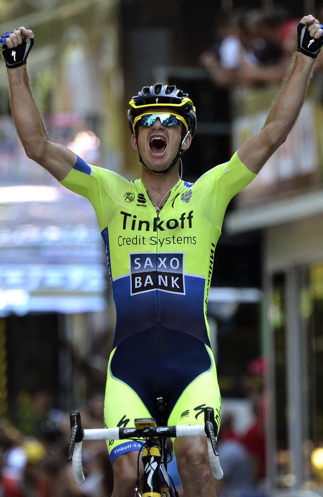 Australia's Michael Rogers celebrates as he crosses the finish line.