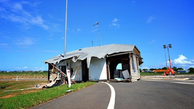 Dislodged house washed onto Queen Street by floodwaters, 2013. A poignant symbol of the flood’s destructive power. Source: John Oxley Library, State Library of Queensland