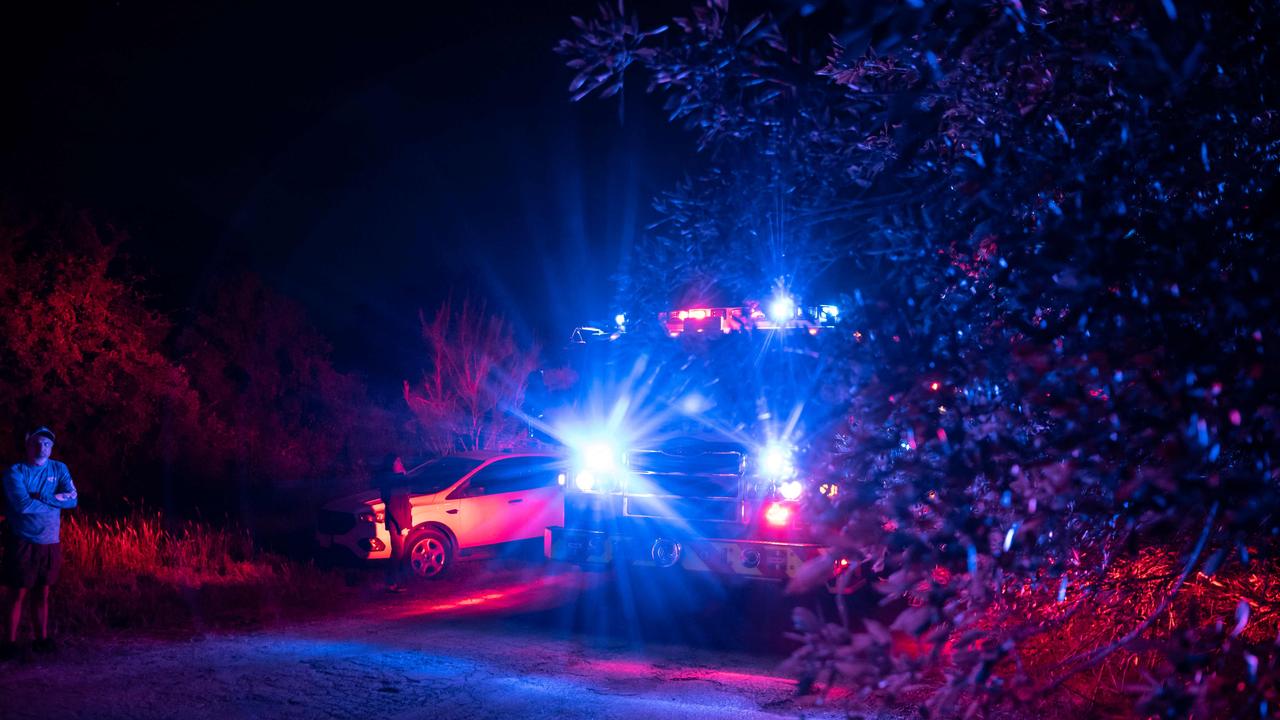 A fire truck makes its way toward the scene where the migrants were discovered. Picture: Sergio Flores/AFP