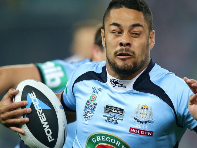 DTM State of Origin 2014 Jarryd Hayne takes on the defense during game 1 of the 2014 Origin series between the Queensland Maroons and the NSW Blues at Suncorp Stadium .Picture Gregg Porteous