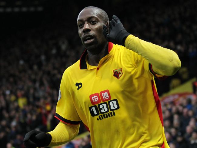 Watford's Italian striker Stefano Okaka celebrates after scoring during the English Premier League football match between Watford and Everton at Vicarage Road Stadium in Watford, north of London on December 10, 2016. / AFP PHOTO / Ian KINGTON / RESTRICTED TO EDITORIAL USE. No use with unauthorized audio, video, data, fixture lists, club/league logos or 'live' services. Online in-match use limited to 75 images, no video emulation. No use in betting, games or single club/league/player publications. /