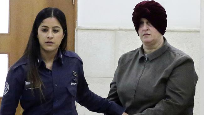 Malka Leifer, right entering brought to a courtroom in Jerusalem. Picture: Mahmoud Illean File)