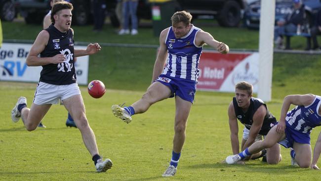 MPFNL: James Longley gets a kick for Langwarrin. Picture: Valeriu Campan