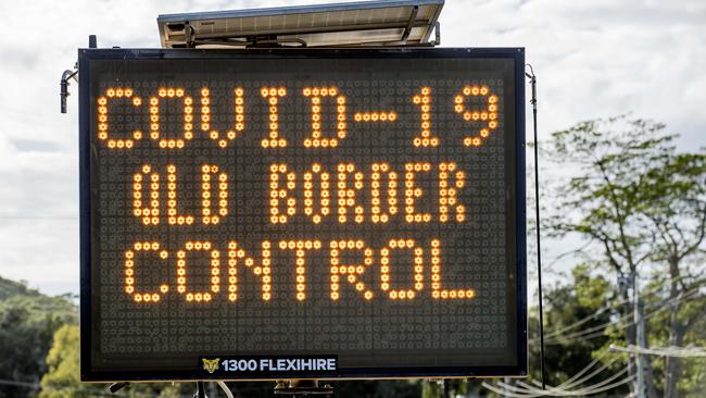 A road sign warning motorists of the COVID-19 QLD Border  control  by Queensland police enforcing the QLD state border closer  due to Coronavirus (COVID-19) and   checking  drivers  as they cross from NSW to QLD at Gold Coast Highway at Bilinga. .   Picture: Jerad Williams