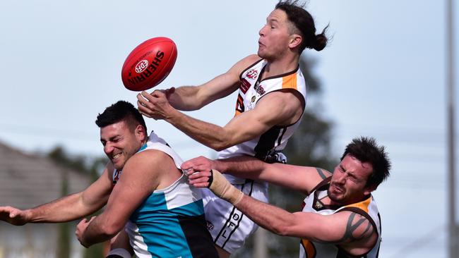 EDFL: Craigieburn v Hillside. Liam Middleton flies high for a mark for Craigieburn. Picture: Jamie Morey