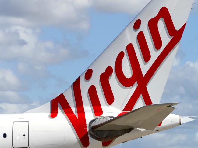 The new Virgin Australia logo on the tail of one of the Airbus A330 aircraft during announcement of rebranding from Virgin Blue at Sydney Airport in Sydney.