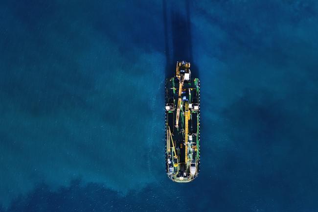 The giant Rock Dredge works on the Artificial reef just offshore from Nineteenth Ave Palm Beach. Picture Glenn Hampson