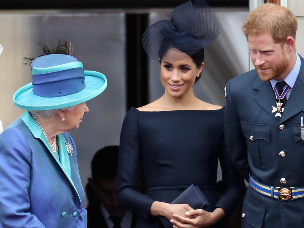 Once were royals ... the Queen with Meghan Markle and Prince Harry in 2018. Picture: Getty