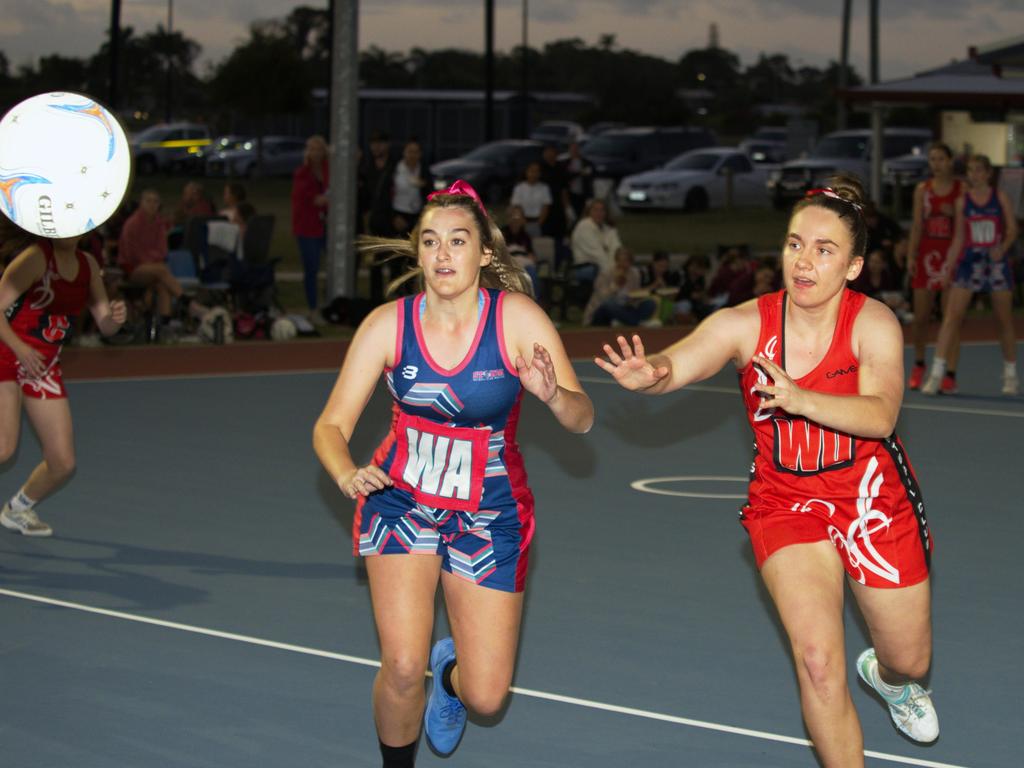 DAS player Emma Carroll receiving the throw while Storm's Sophie Ruggeri goes for the intercept in the 2021 Mackay Netball Association seniors grand final. September 4th, 2021 Picture: Marty Strecker