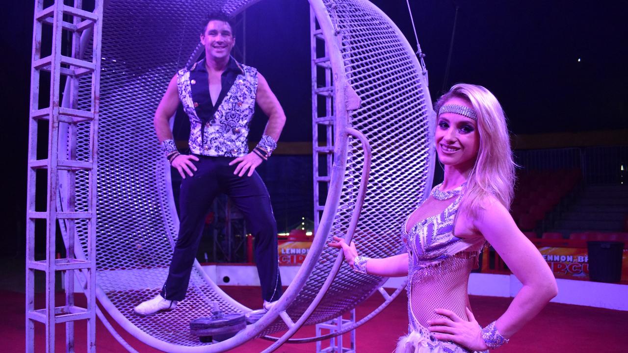 Lennon Brothers Circus Performers (L) Daredevil Jansen Grant and juggler/ lasso artist Kelly Maynard by the wheel of death. Photo: Stuart Fast