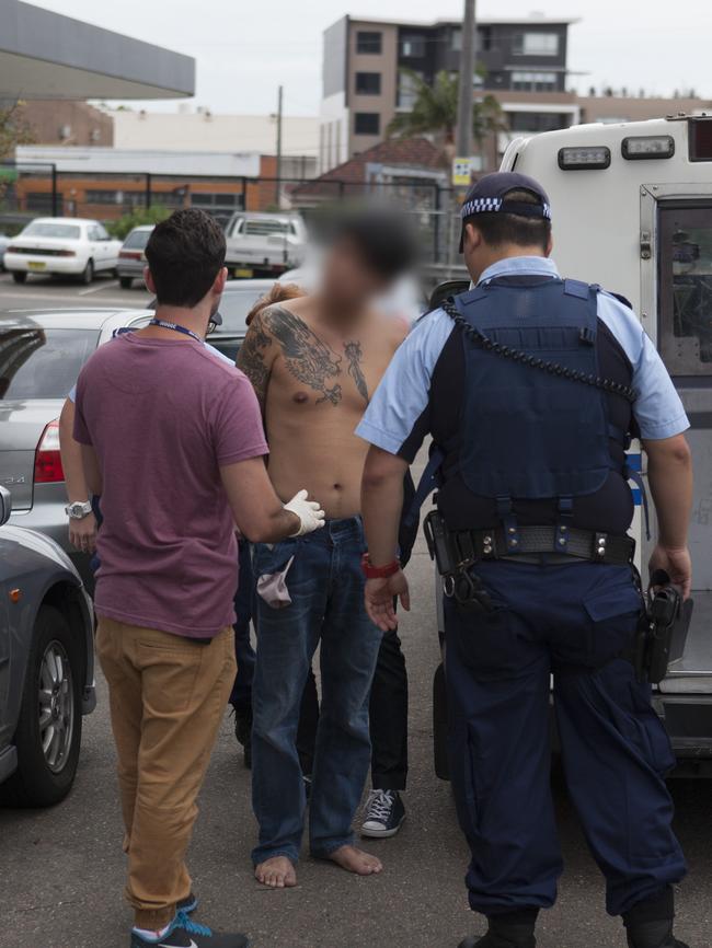 Under arrest ... Police swoop on suspect. Picture: AFP