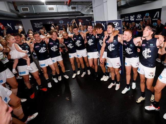 The Blues sing the team song after their thrilling win at the Gabba on Friday night. Picture: Dylan Burns/AFL Photos via Getty Images.