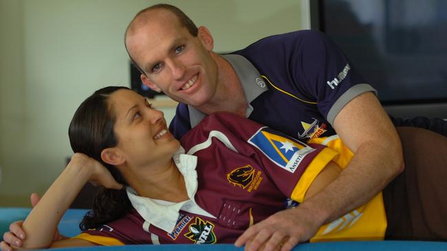 Scott Minto indulges in some gentle spooning with wife Bindi after making the move to the Cowboys.