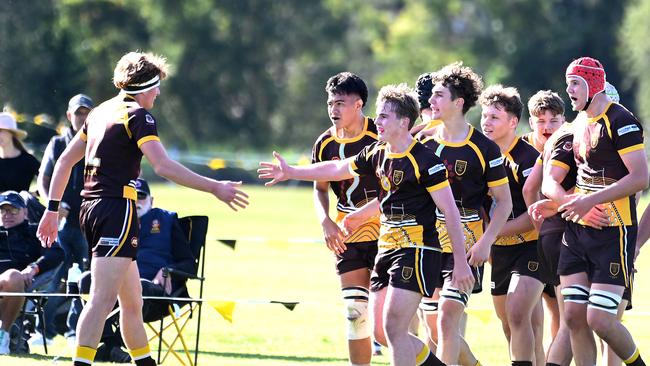 Padua College players celebrate AIC First XV rugby grand final between St Laurence's College and Padua COllege. Saturday June 8, 2024. Picture, John Gass