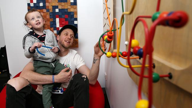 Basketball star Joe Ingles with his son Jacob in Marvel Stadiums new Sensory Room. Picture: Michael Klein