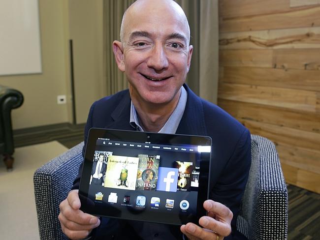 Amazon founder Jeff Bezos with Amazon Kindle HDX.