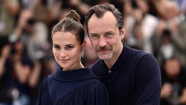 You have to feel for Law’s co-star, Alicia Vikander. Picture: Loic Venance/AFP