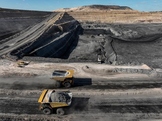 12 April 2022. Coal mining operations from Bravus (formerly known as Adani) at their Carmichael Coal Mine, Qld.Haul trucks as part of interburden removal to expose the next coal seam at the Carmichael minePIC: Cameron Laird