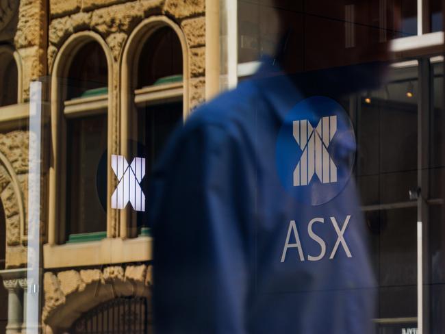 SYDNEY, AUSTRALIA - NewsWire Photos, October 29 2024. GENERIC. Stocks. Finance. Economy. People walk past the Australian Stock Exchange, ASX, on Bridge Street. Picture: NewsWire / Max Mason-Hubers