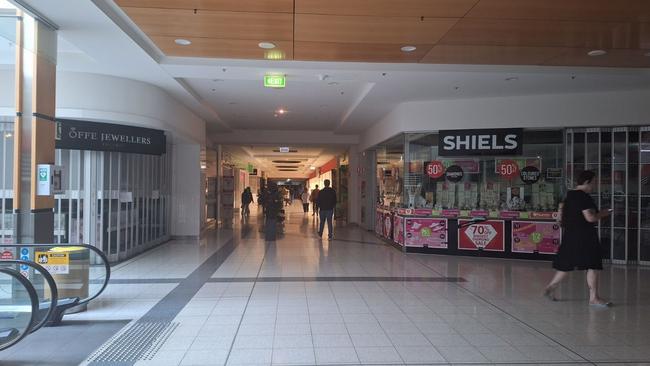 Power is out at Mt Barker mall, leaving stores in darkness. Picture: Jes Grace