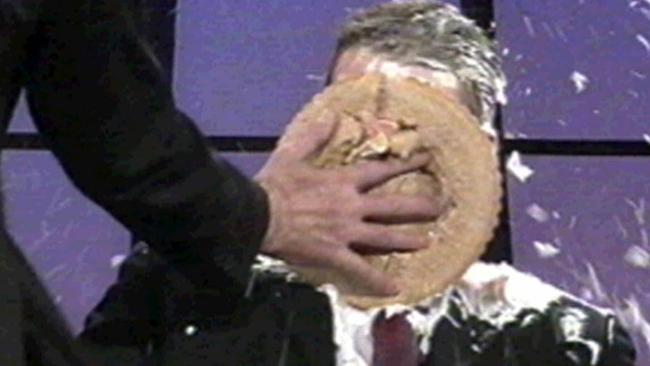 Sam Newman smashes a pie into the face of then footballer David Schwarz.