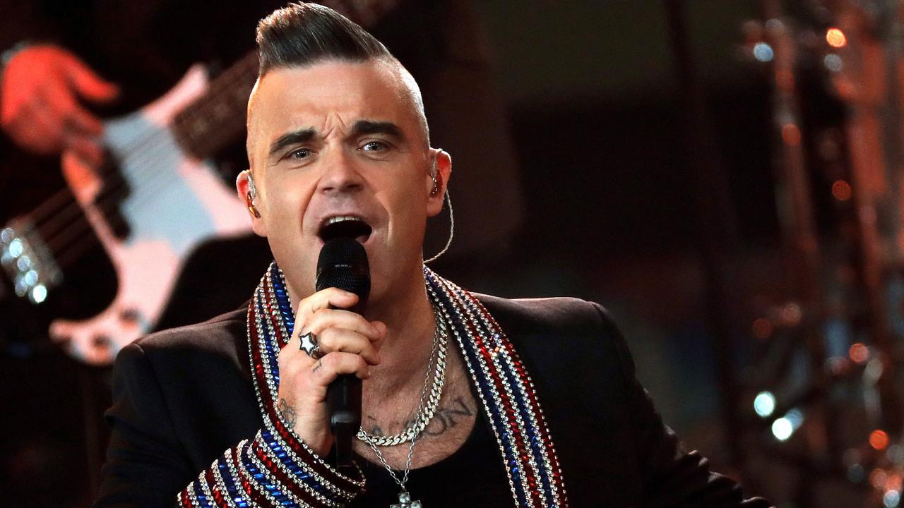 Inside the AFL’s move to secure Robbie Williams for Grand Final ...