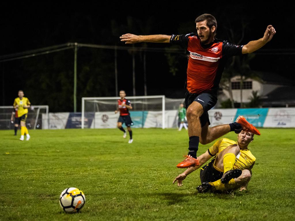 Leichhart's Cody Eszes takes flight in Saturdays FNQ Premier League Grand final between Edge Hill United and Leichhardt at Endeavour Park. Picture: Emily Barker