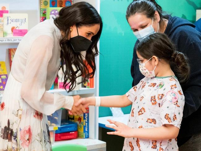 Meghan Markle wore a $5000 designer dress and face mask. Picture: Children's Hospital LA