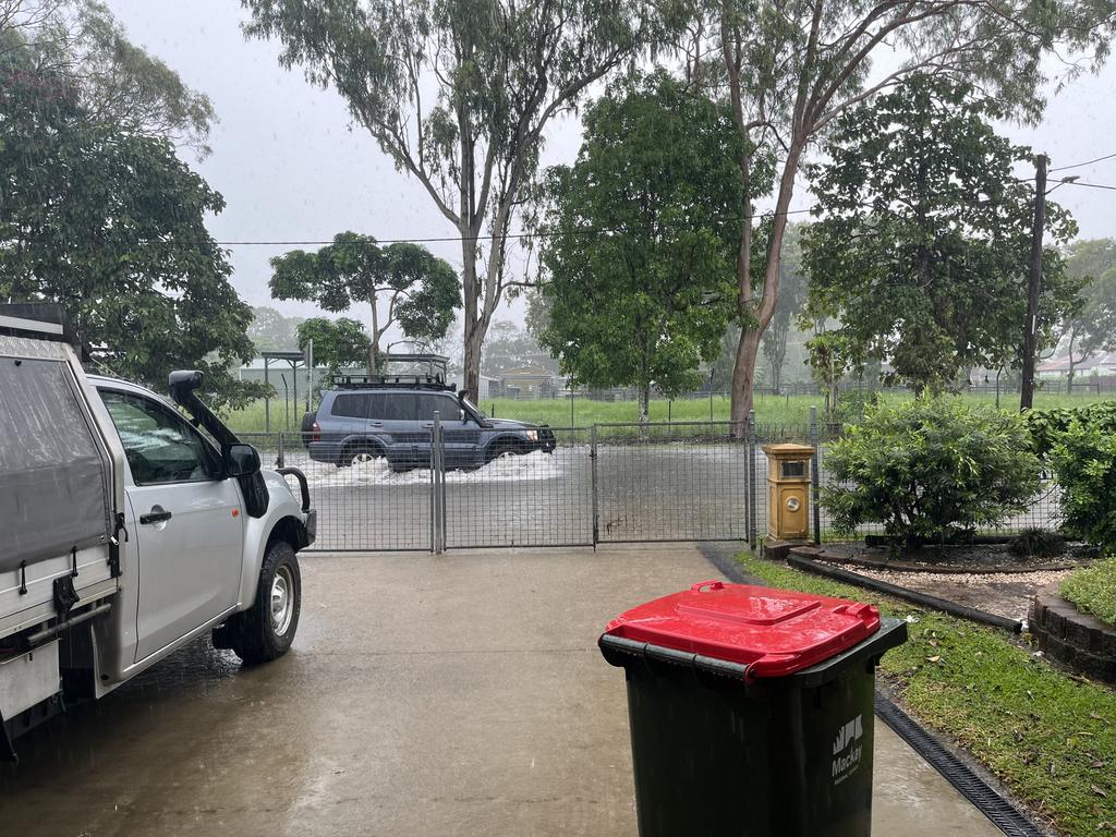 Eric, a resident of Forth St in South Mackay, had water lapping at his garage door at 6.30am on February 4, 2025. When cars drive through at speed his property gets slapped with water. Photo taken at 9am. Picture: Luke Lay