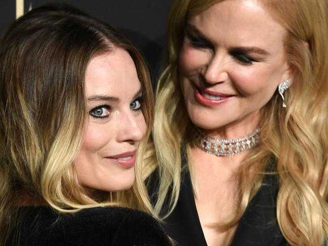 TOPSHOT - Australian actresses Nicole Kidman (R) and Margot Robbie arrive for the 26th annual ELLE Women in Hollywood Celebration in Beverly Hills, California, on October 14, 2019. (Photo by VALERIE MACON / AFP)