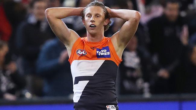 A dejected Lachie Whitfield after the Giants’ loss to Collingwood. Picture: Phil Hillyard