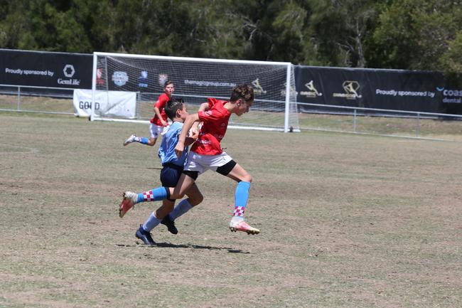 The Premier Invitational football tournament on the Gold Coast. Gold Coast Knights Red v Springfield United under-13s in action. Picture: Mike Batterham.