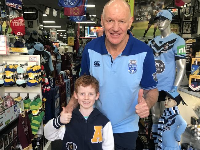 Peter 'Wally' Wynn and Xavier Mobbs, 8, at Peter Wynn Score hours before kick-off in State of Origin III.