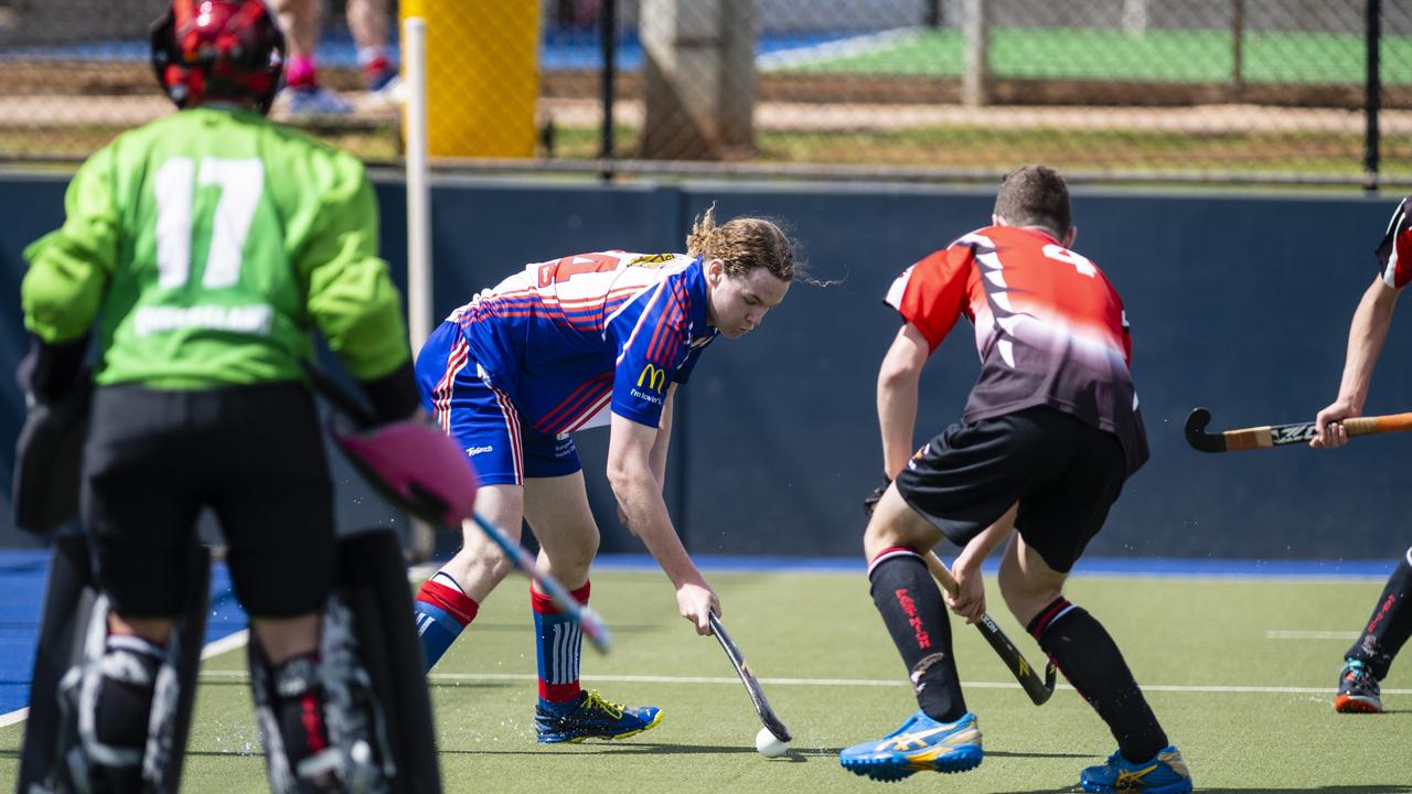 Hamish Speed (centre) of Rangeville against Past High in J1 boys grand final hockey at Clyde Park, Saturday, September 10, 2022. Picture: Kevin Farmer