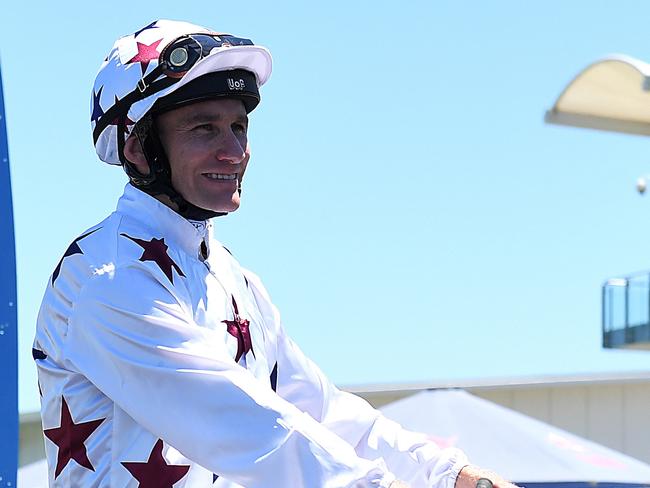 Jockey Luke Currie returns to scale after riding Sunlight to win race 2, the QTIS Two-Years-Old Handicap, during the Ladies Day Raceday at Aquis Park on the Gold Coast, Saturday, January 6, 2018. (AAP Image/Albert Perez) NO ARCHIVING, EDITORIAL USE ONLY