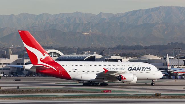 A weak dollar could make it more expensive to holiday in the US and put pressure on airlines such as Qantas to lift airfares.