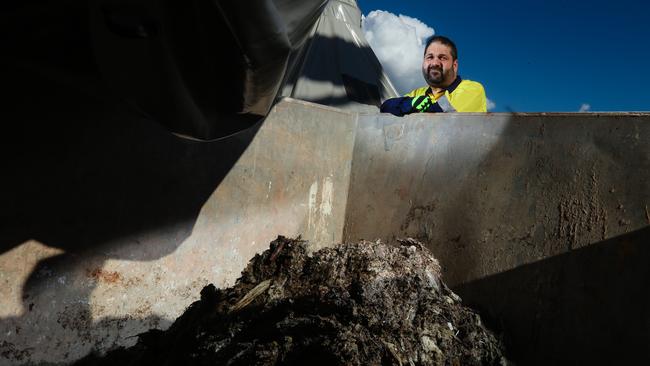 Skefos Tsoukalis, senior asset manager at Power and Water’s Leanyer sewerage treatment plant, with just some of the tonnes of untreatable material that gets flushed down Darwin's toilets, especially baby wipes. Picture: Glenn Campbell