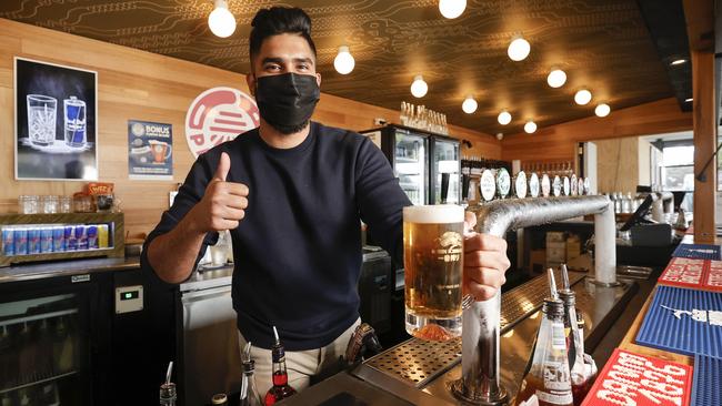 Ocean Beach Pavilion Manager Dilan Kay is excited to be pouring beers for Victorians once again. Picture: Alex Coppel.