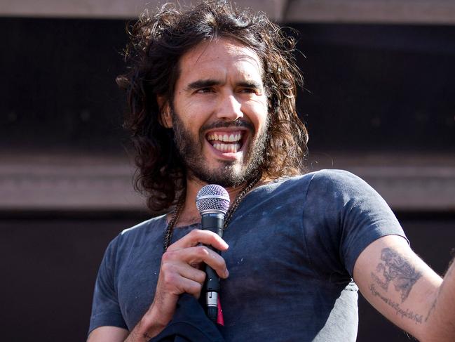 (FILES) British actor and comedian Russell Brand addresses an anti-austerity rally in Parliament Square in London on June 21, 2014. London police have questioned the comedian and actor Russell Brand over allegations of three sexual offences, The Times reported on November 19, 2023, following claims from several women of rape, sexual assault and emotional abuse. Brand, 48, has denied the claims stemming from an investigation by The Times, Sunday Times and Channel 4 of the alleged incidents, which are said to have taken place between 2006 and 2013. (Photo by Justin TALLIS / AFP)