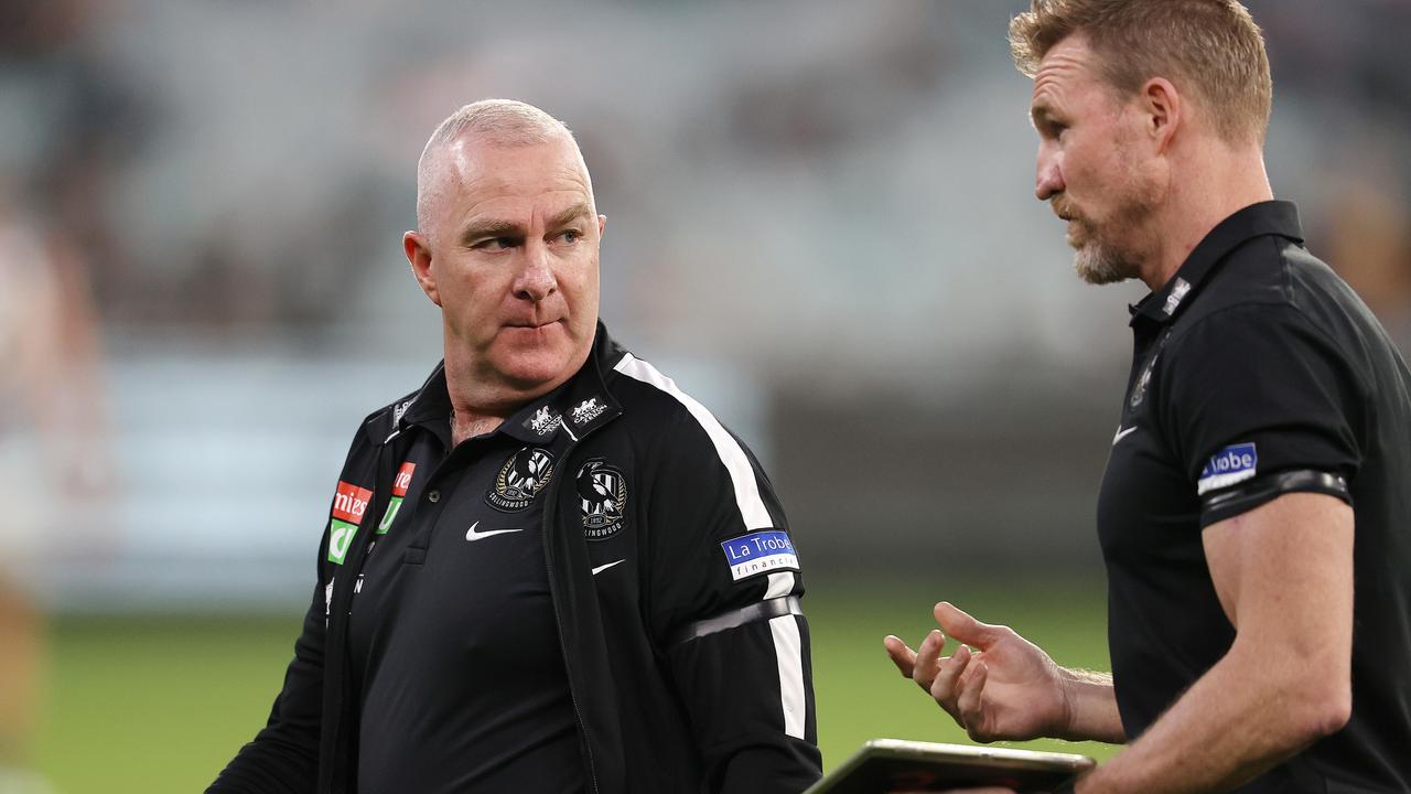 Graham Wright and Buckley talk tactics during their time at Collingwood. Picture: Michael Klein